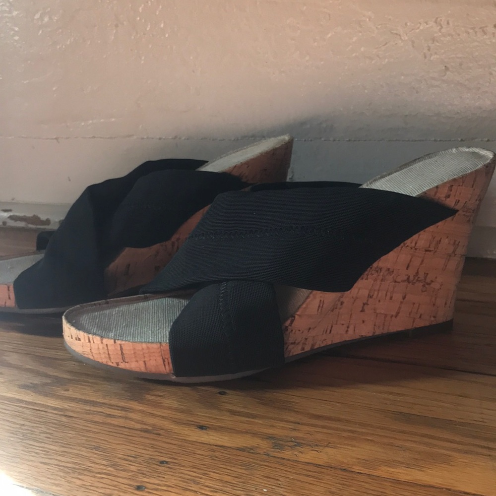 Black strap cork wedges.